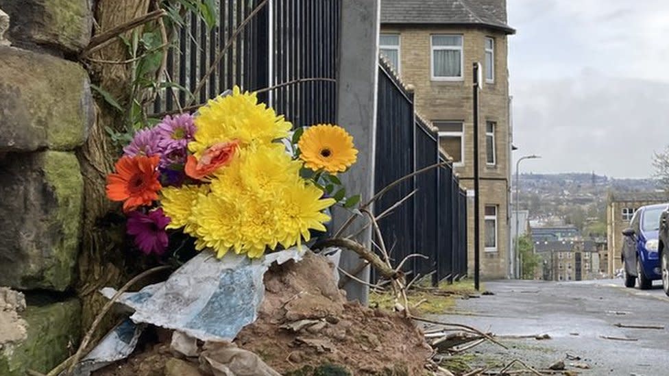 Flowers left at the scene of a murder in Bradford