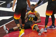 Utah Jazz forward Royce O'Neale (23) reacts after being fouled by Los Angeles Clippers forward Kawhi Leonard during the first half of Game 2 of a second-round NBA basketball playoff series Thursday, June 10, 2021, in Salt Lake City. (AP Photo/Rick Bowmer)