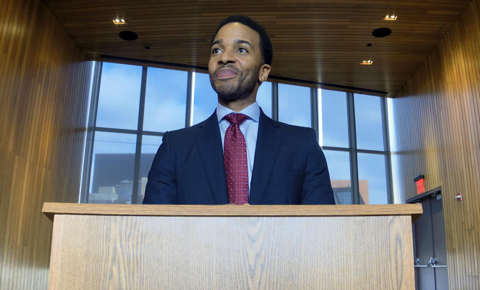 This image released by Netflix shows André Holland in a scene from "High Flying Bird." (Peter Andrews/Netflix via AP)