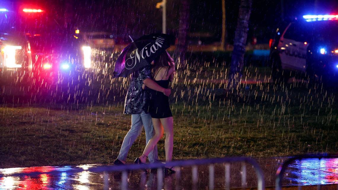 A downpour dampens spring break party before midnight curfew on Miami Beach, Florida on Sunday, March 17, 2024.