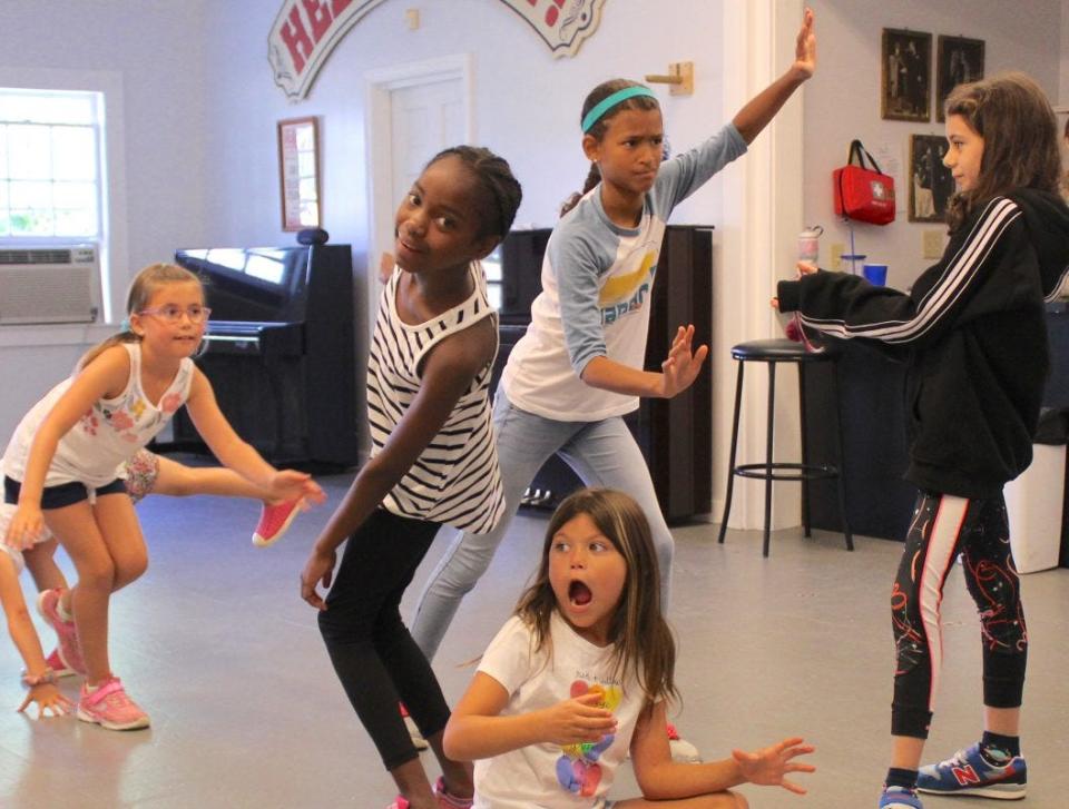 Students imitate animals in a Cape Playhouse summer workshop.