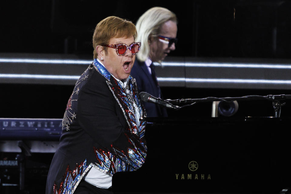 Sir Elton John performs live at the Elton John's final North American show of his "Farewell Yellow Brick Road" tour on Sunday, Nov. 20, 2022, at the Dodger Stadium in Los Angeles. (Photo by Willy Sanjuan/Invision/AP)