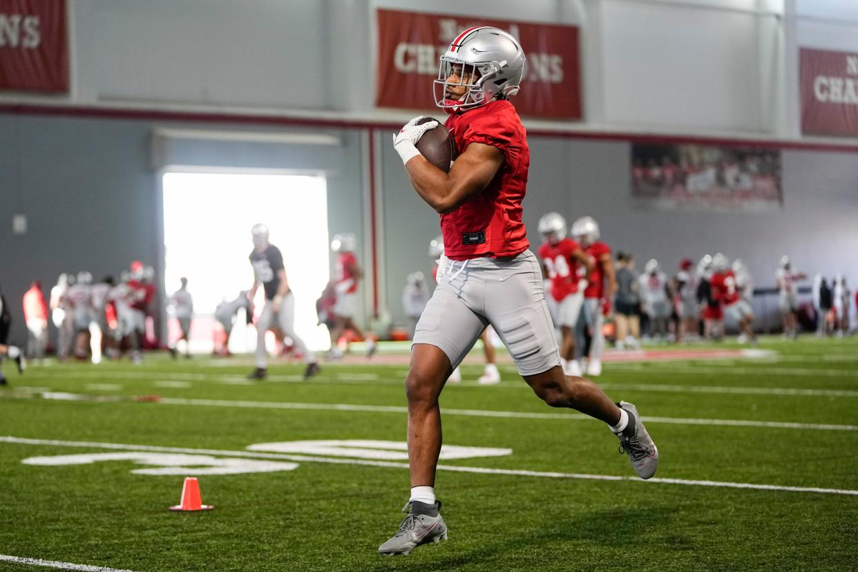 Mar 5, 2024; Columbus, OH, USA; Ohio State Buckeyes running back Dallan Hayden (5) catches a pass during the first spring practice at the Woody Hayes Athletic Center.