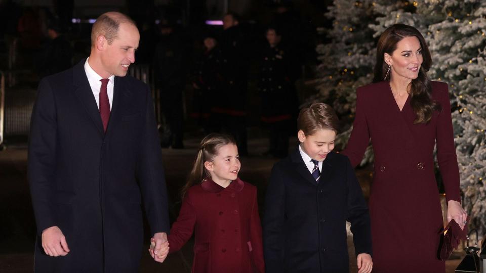 Prince William and Princess Kate walking with Princess Charlotte and Prince George