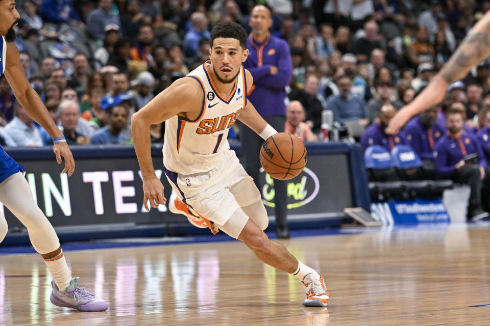 Dec 5, 2022; Dallas, Texas, USA; Phoenix Suns guard Devin Booker (1) in action during the game between the Dallas Mavericks and the Phoenix Suns at American Airlines Center. Mandatory Credit: Jerome Miron-USA TODAY Sports