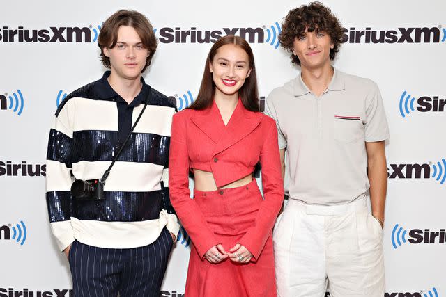 <p>Cindy Ord/Getty</p> Christopher Briney, Lola Tung and Gavin Casalegno visit the SiriusXM Studios on June 28, 2023 in New York City