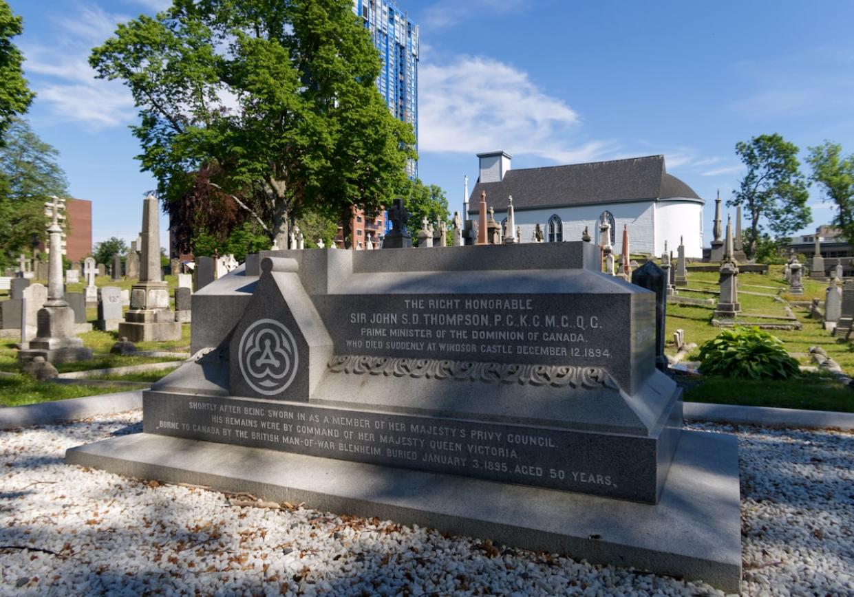 Former prime minister John Thompson is buried at Holy Cross Cemetery in Halifax. Thompson was 49 when he died, not 50 as listed on the grave marker. (Vernon Ramesar/CBC - image credit)