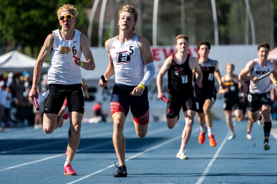 CPU's Nathan Miller, left, and Ballard's Chance Lande run the 3A 4x400 meter relay during the Iowa high school state track and field meet at Drake Stadium on Saturday, May 18, 2024, in Des Moines.
