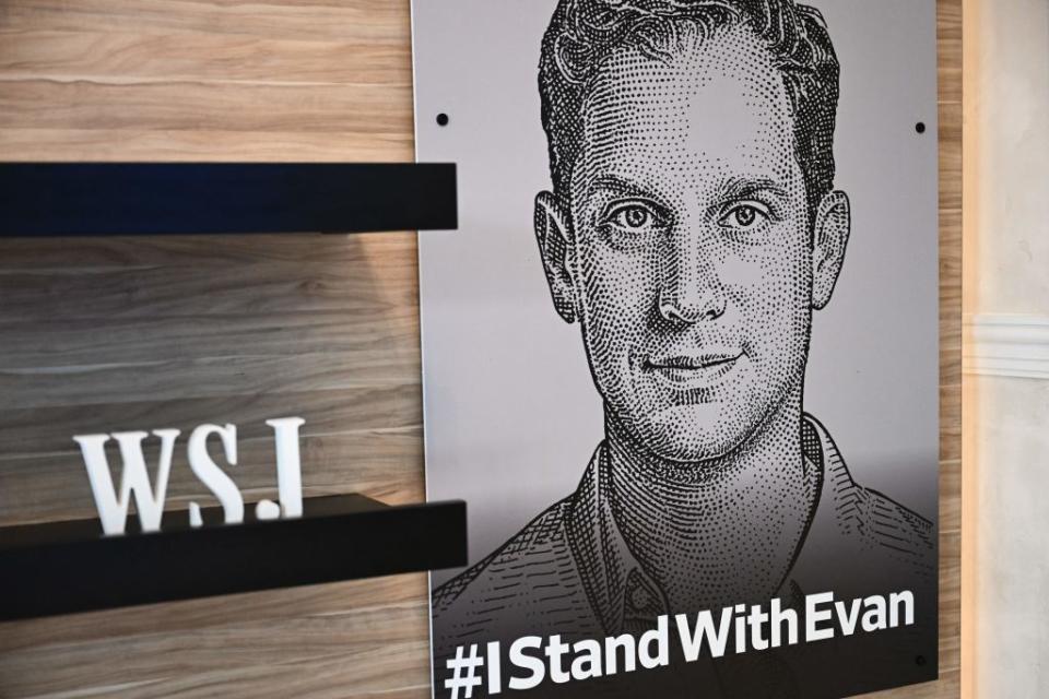 An illustration of Wall Street Journal reporter Evan Gershkovich, who was arrested on espionage charges in Russia, is displayed during the WSJ Tech Live conference in Laguna Beach, California, on October 16, 2023. (Photo by PATRICK T. FALLON/AFP via Getty Images)