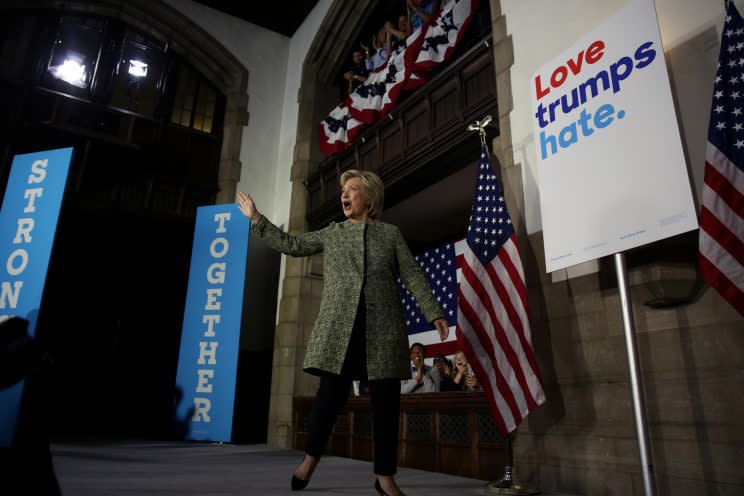 U.S. Democratic presidential candidate Hillary Clinton waves as she arrives to speak at Temple University in Philadelphia, Pennsylvania, U.S. September 19, 2016. REUTERS/Carlos Barria - RTSOGSZ