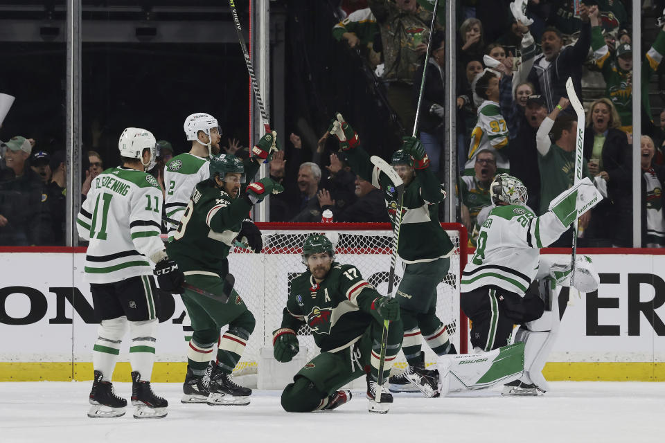 Minnesota Wild left wing Marcus Foligno (17) celebrates his goal against the Dallas Stars during the second period of Game 3 of an NHL hockey Stanley Cup first-round playoff series Friday, April 21, 2023, in St. Paul, Minn. (AP Photo/Stacy Bengs)