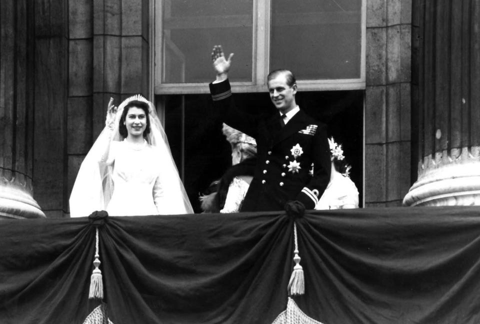 <p>The Queen’s Westminster Abbey wedding, held on 20 November 1947, was attended by 2000 guests and broadcast to 200 million radio listeners globally. The Queen’s iconic bridal gown (boasting motfis of star lilies and orange blossoms) was paid for using post-war ration coupons and designed by Norman Hartness Following the ceremony, the young couple waved to the adoring British public from the balcony of Buckingham Palace. <em>[Photo: Getty]</em> </p>