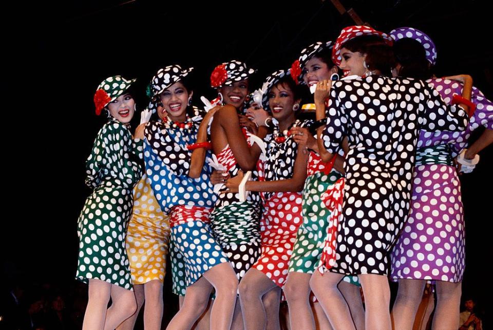 <p>French design house Emanuel Ungaro shows its spring 1985 ready-to-wear collection in Paris. The models are wearing polka-dot dresses with matching hats.</p>