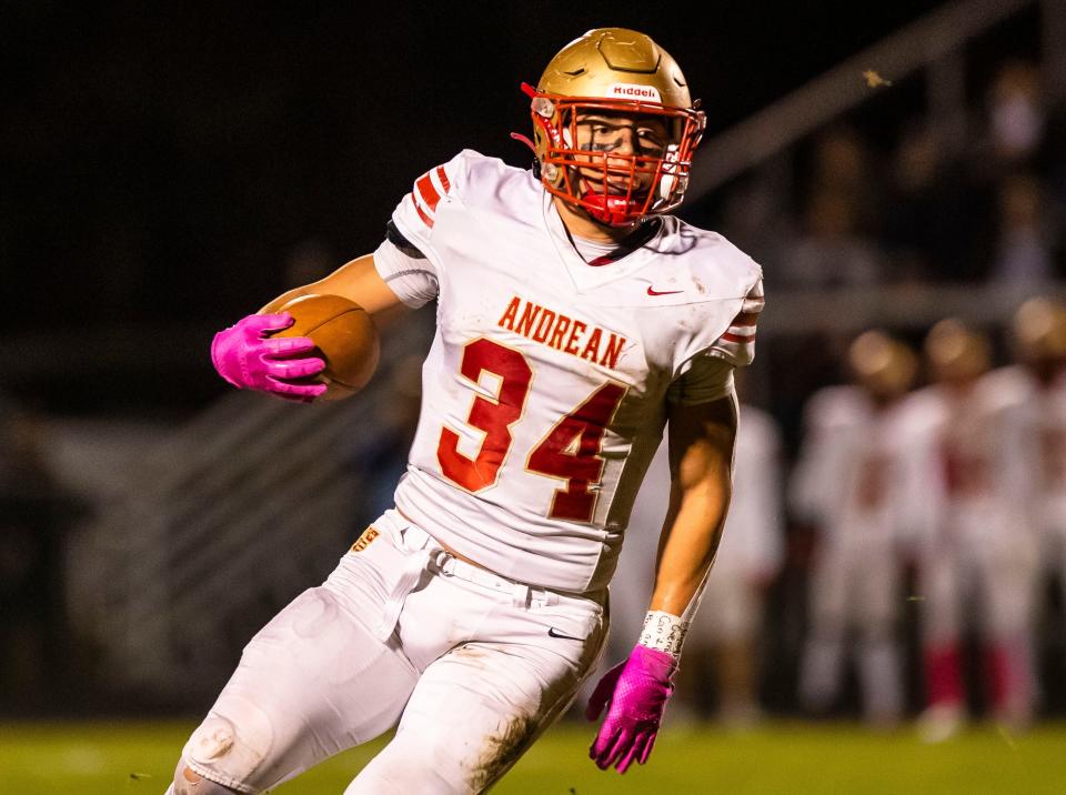 Andrean's Drayk Bowen (34) runs the ball during the Andrean vs. LaVille sectional semifinal football game Friday, Oct. 28, 2022 at LaVille High School.