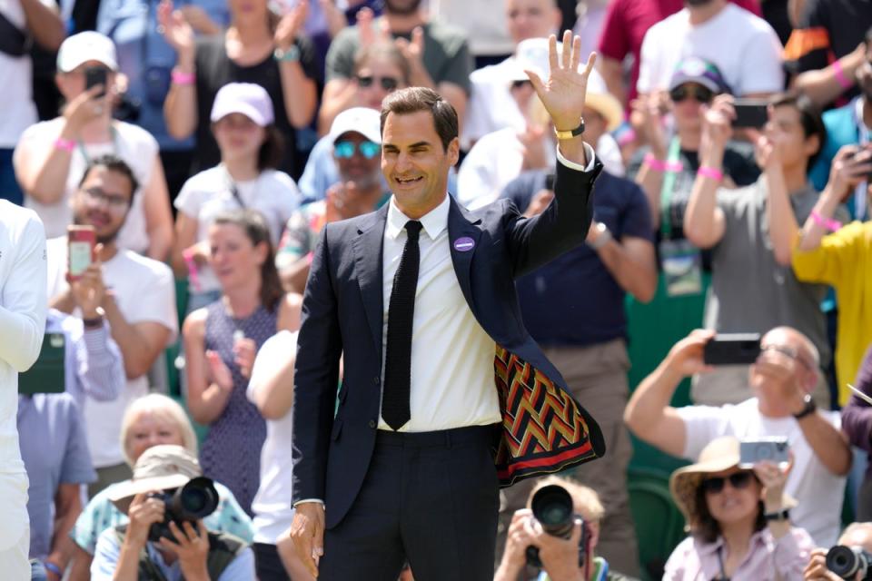Roger Federer was given a rapturous reception on his return to Centre Court (Kirsty Wigglesworth/AP) (AP)