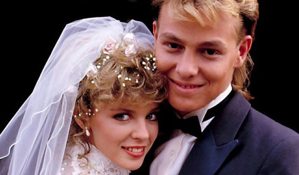 Kylie Minogue and Jason Donovan as Charlene and Scott Robinson (Credit: Neighbours/Grundy Television)