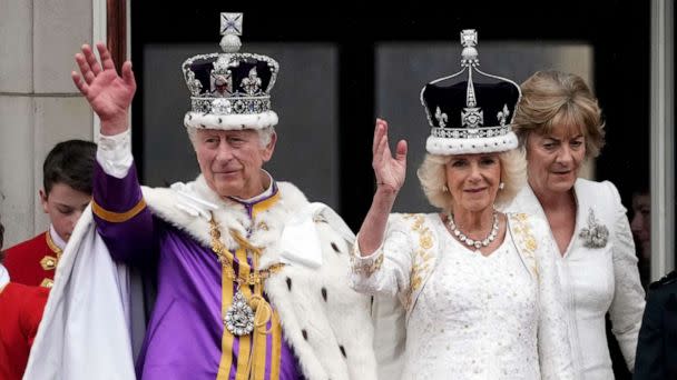 PHOTO: King Charles III and Queen Camilla can be seen on the Buckingham Palace balcony ahead of the flypast during the Coronation of King Charles III and Queen Camilla, May 06, 2023 in London. (Christopher Furlong/Getty Images)