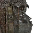 A bronze sculpture depicting an Oba (king) of Benin is seen in this handout photo