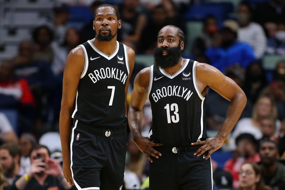 NEW ORLEANS, LOUISIANA - NOVEMBER 12: Kevin Durant #7 and James Harden #13 of the Brooklyn Nets talk during a game against the New Orleans Pelicans at the Smoothie King Center on November 12, 2021 in New Orleans, Louisiana. NOTE TO USER: User expressly acknowledges and agrees that, by downloading and or using this Photograph, user is consenting to the terms and conditions of the Getty Images License Agreement. (Photo by Jonathan Bachman/Getty Images)