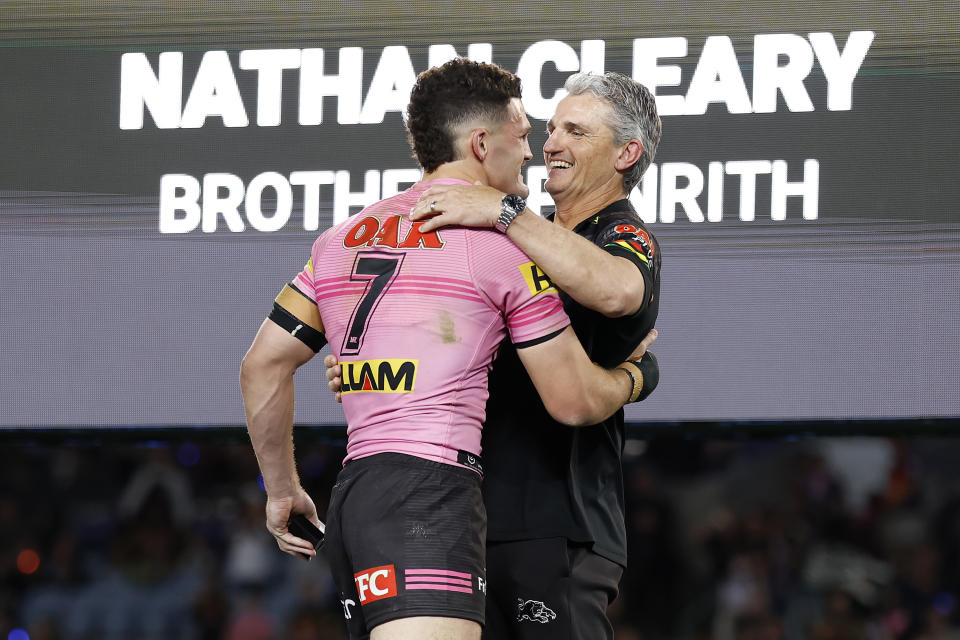 Nathan Cleary celebrates with his father and coach Ivan Cleary.