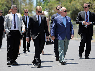 Brett Lee and Alan Jones arrive at the funeral service.