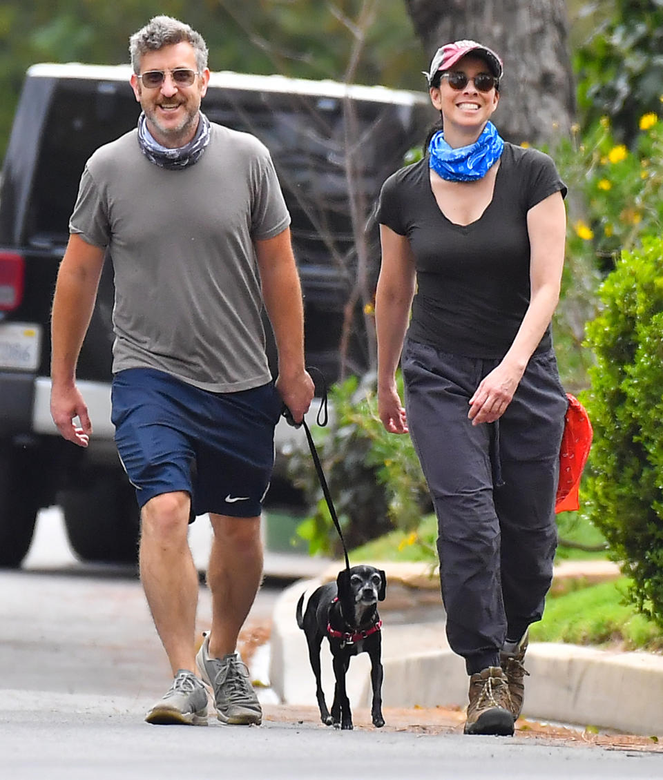 <p>Sarah Silverman and boyfriend Rory Albanese are all smiles while walking their dog in L.A. on Thursday.</p>