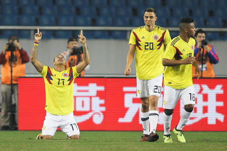 El delantero colombiano Felipe Pardo (17) festeja tras convertir de visita frente a China en un encuentro amistoso en Chongqing. REUTERS/Stringer IMAGEN CEDIDA A REUTERS, CON RESTRICCIÓN DE USO EN TERRITORIO CHINO