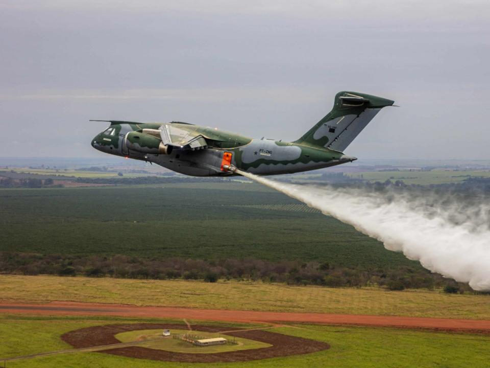 Water being dropped for fires from the C-390.