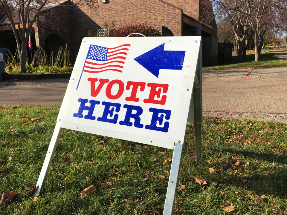 A polling location sign for voting in USA.