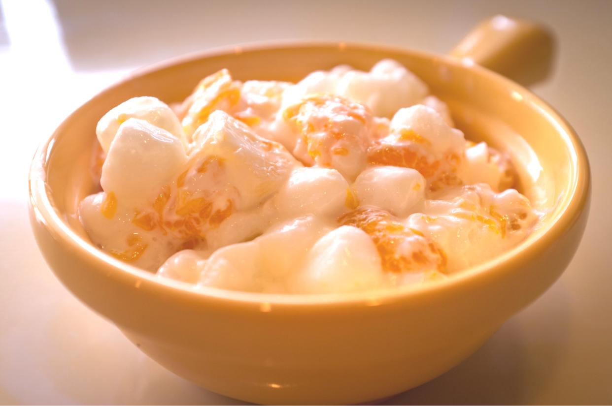 Creamy ambrosia salad with marshmallows, pineapple and mandarin oranges