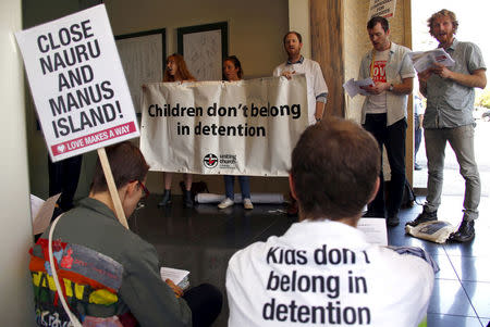 A group of around twenty protesters occupy Australian Prime Minister Malcolm Turnbull's electoral office, demanding the end to the policy of offshore detention of asylum seekers in the Sydney suburb of Edgecliff, Australia, October 14, 2015. REUTERS/David Gray/File Photo