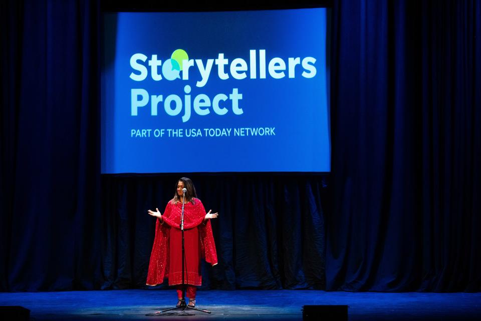 Erlin Kakkanad tells a story during the Des Moines Register Storytellers Project's "Community" show Tuesday, Feb. 27, 2024, at Hoyt Sherman Place in Des Moines.