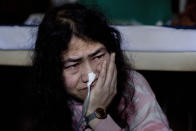 FILE - India's most famous prisoner of conscience Irom Sharmila, who has been on a hunger strike since November 2000 to protest against the Armed Forces Special (Powers) Act, cries by her bed at the Jawaharlal Nehru Hospital in Imphal, in the northeastern Indian state of Manipur, Nov. 3, 2014. The act gives the military sweeping powers to search, arrest and even shoot suspects with little fear of prosecution. Human rights groups have long accused security forces of abusing the law. Sharmila ended her 16-year hunger strike on Aug. 9, 2016. (AP Photo/Anupam Nath, File)