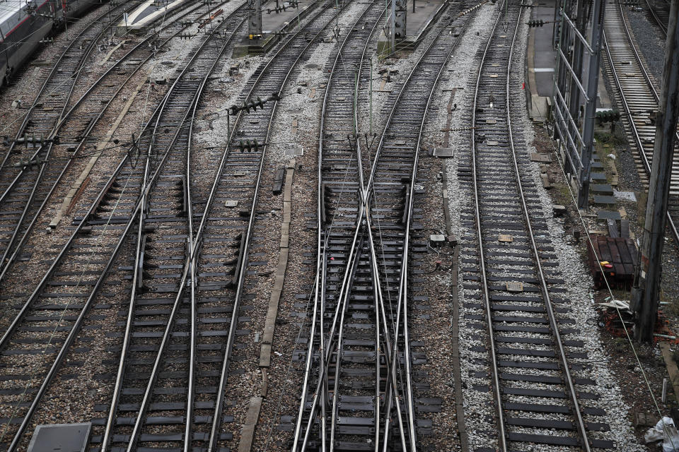 Empty tracks at Gare de L'Est train station in Paris, Saturday, Dec. 7, 2019. French strikes are disrupting weekend travel around the country, as truckers blocked highways and most trains remained at a standstill because of worker anger at President Emmanuel Macron's policies as a mass movement against the government's plan to redesign the national retirement system entered a third day. (AP Photo/Francois Mori)