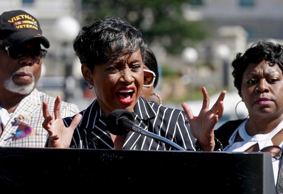 TV Judge Glenda Hatchett, center, gestures as she addresses a news conference as Valerie Castile, the mother of Philando Castile, right, listens during a news conference on the State Capitol grounds, July 12, 2016, in St. Paul, Minn. A Georgia sheriff pleaded guilty Monday, Aug. 21, 2023, to groping Hatchett during a law enforcement conference last year, and resigned from office.