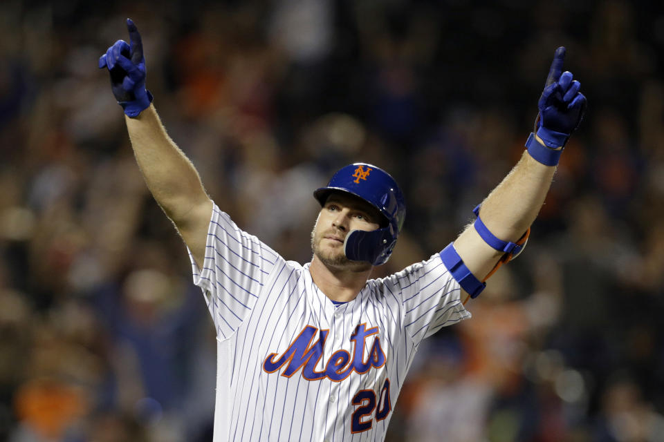 FILE - In this Sept. 28, 2019, file photo, New York Mets' Pete Alonso reacts after hitting his 53rd home run of the season during the third inning of a baseball game against the Atlanta Braves in New York. Fifteen games were generated Thursday, March 26, 2020, by Strat-O-Matic _ one for every game postponed on opening day because of the coronavirus. The results were produced by computer simulations, which the New York-based company will continue to run daily while the real thing is on hiatus. (AP Photo/Adam Hunger, File)