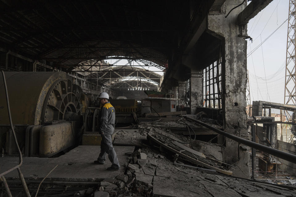 A worker walks inside DTEK's power plant which was destroyed by a Russian missile attack in Ukraine, on Monday, April 1, 2024. Russia is attacking Ukraine’s energy sector with renewed intensity and alarming accuracy, signaling to Ukrainian officials that Russia is armed with better intelligence and fresh tactics in its campaign to annihilate the country’s power generation capacity. (AP Photo/Evgeniy Maloletka)