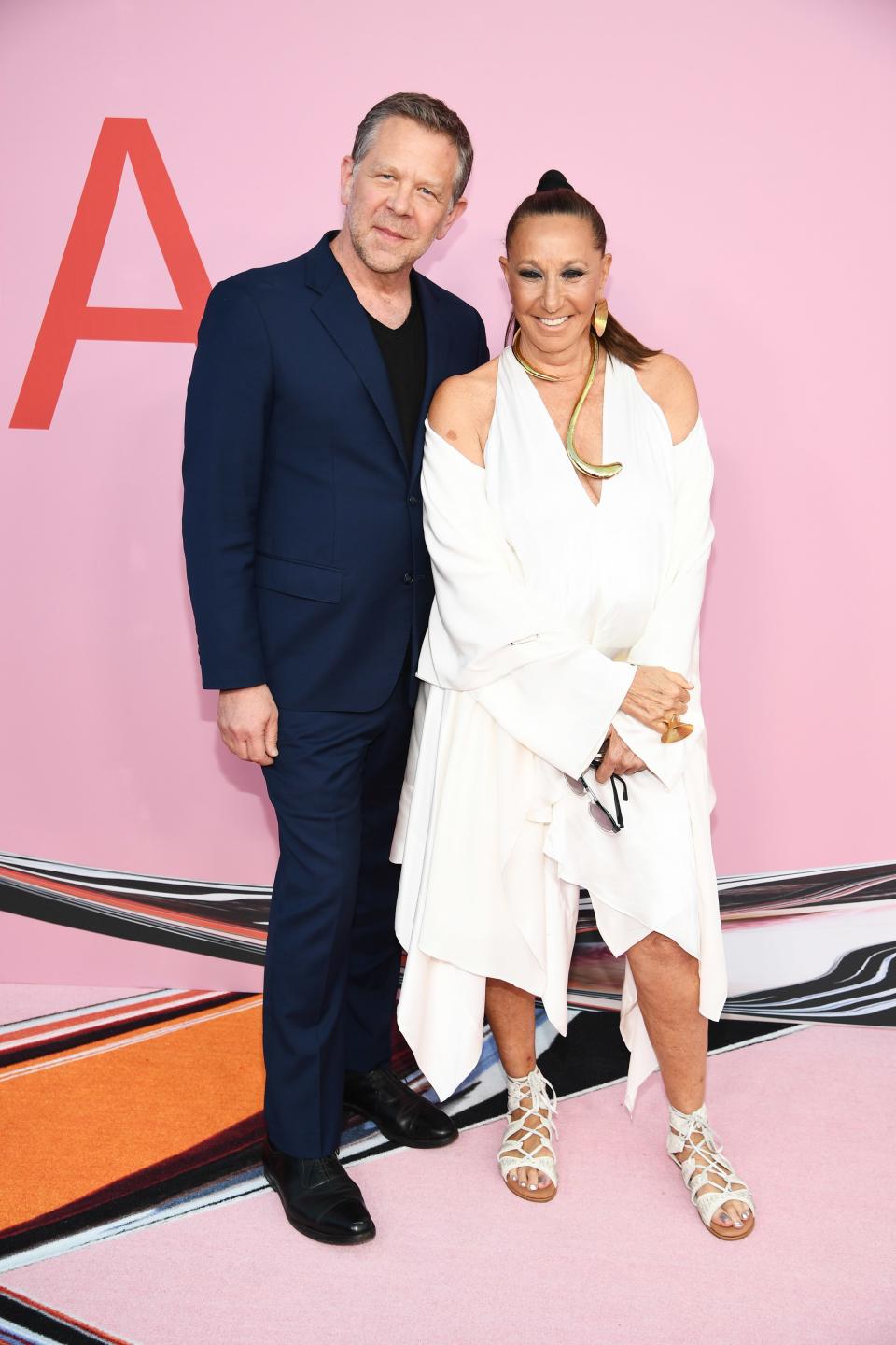 <h1 class="title">Joel Towers and Donna Karan</h1><cite class="credit">Photo: Getty Images</cite>