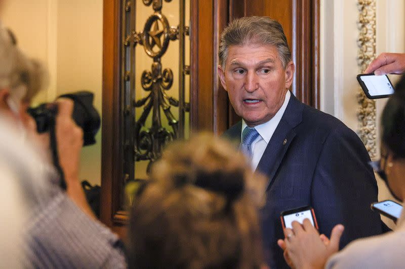 U.S. Senator Joe Manchin faces reporters after Senate advanced debt limit increase on Capitol Hill in Washington