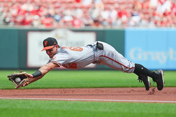 Rylan Bannon #65 of the Baltimore Orioles fields a ground ball against the St. Louis Cardinals in the first inning in his MLB debut at Busch Stadium on May 12, 2022 in St Louis, Missouri. (Photo by Dilip Vishwanat/Getty Images)