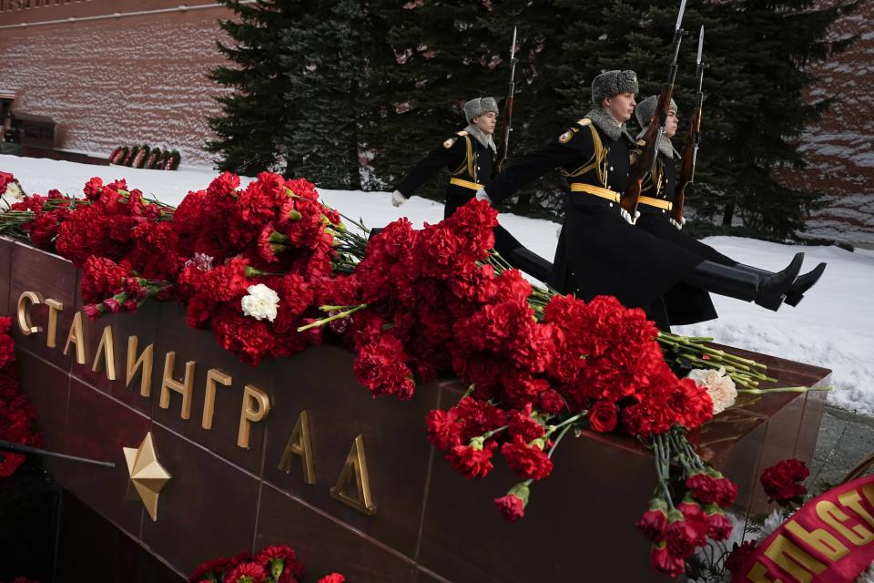 Members of honor guards march at the Tomb Stalingrad during a wreath-laying ceremony at the Tomb of the Unknown Soldier near the Kremlin Wall attending commemorations marking the 80th anniversary of the Soviet victory in the battle of Stalingrad in Moscow, Russia, Thursday, Feb. 2, 2023. The battle of Stalingrad turned the tide of World War II and is regarded as the bloodiest battle in history, with the death toll for soldiers and civilians estimated at about 2 millions. (AP Photo/Alexander Zemlianichenko)