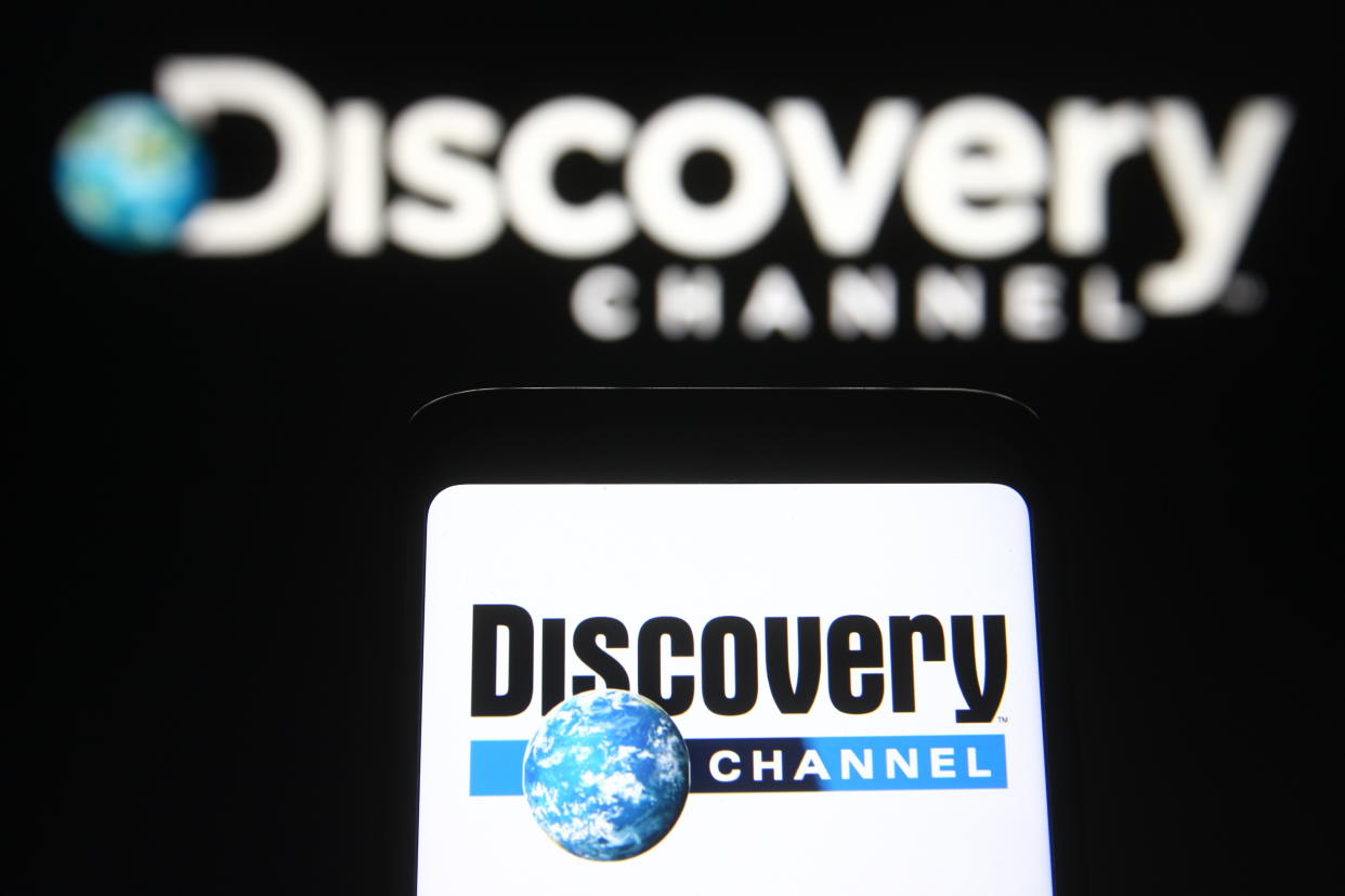 UKRAINE - 2021/05/14: In this photo illustration the Discovery Channel logo of an US television network is seen on a smartphone and a pc screen. (Photo Illustration by Pavlo Gonchar/SOPA Images/LightRocket via Getty Images)