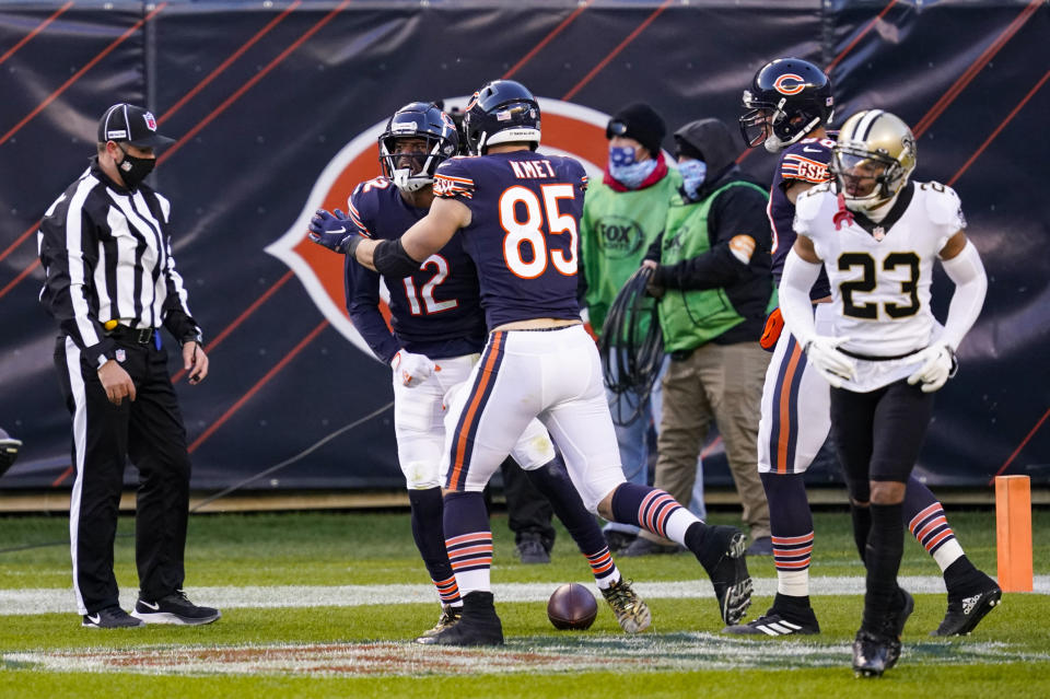 Chicago Bears wide receiver Allen Robinson (12) celebrates with tight end Cole Kmet (85) after a touchdown against the New Orleans Saints in the first half of an NFL football game in Chicago, Sunday, Nov. 1, 2020. (AP Photo/Charles Rex Arbogast)