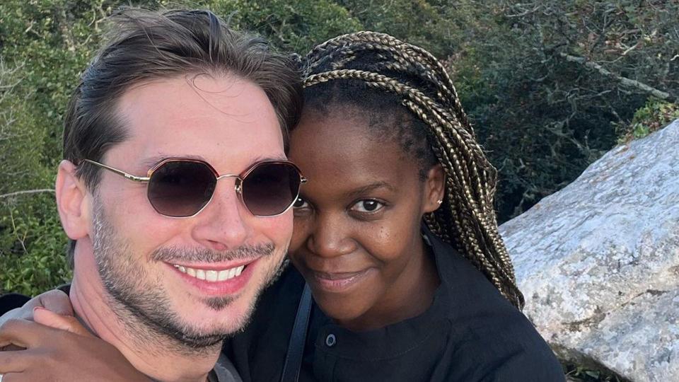 Oti Mabuse pregnant posing on mountain with husband Marius Iepure