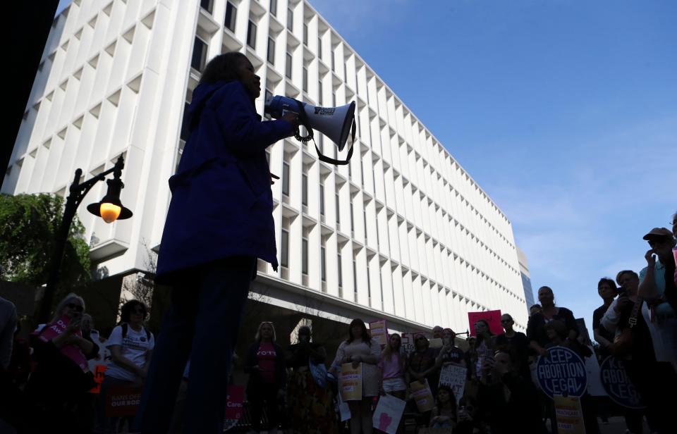 Congresswoman Lisa Blunt Rochester (D-Del) speaks to the dozens of people who gathered adjacent to the J. Caleb Boggs Federal Building & U.S. Courthouse in Wilmington to protest the potential Supreme Court ruling that would likely make abortion illegal in large parts of the United States, Tuesday, May 3, 2022.