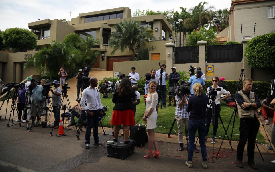 Media outside Arnold Pistorius's mansion