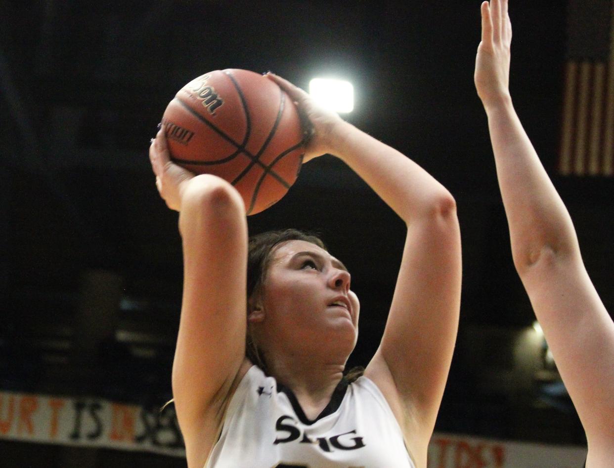 Sacred Heart-Griffin's Callie Huston goes up for a shot against Springfield High during the first game of the City girls basketball tournament at the Bank of Springfield Center on Wednesday, Jan. 25, 2023.