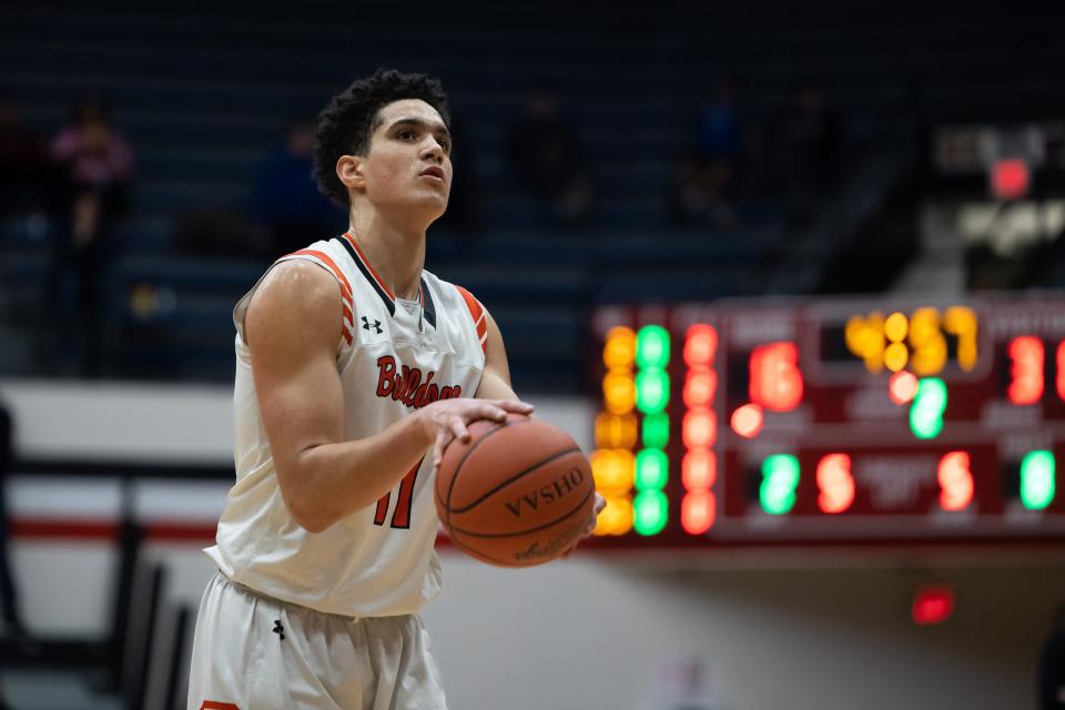 Dalton senior Braylon Wenger lines up a free throw during the Division IV regional final against Richmond Heights at Canton Memorial Field House, March 10, 2023.