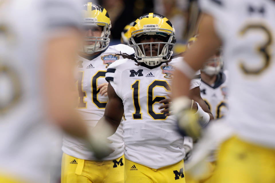 Denard Robinson of the Michigan Wolverines runs on the field during warm ups against the Virginia Tech Hokies during the Allstate Sugar Bowl at Mercedes-Benz Superdome on January 3, 2012 in New Orleans, Louisiana. (Photo by Chris Graythen/Getty Images)