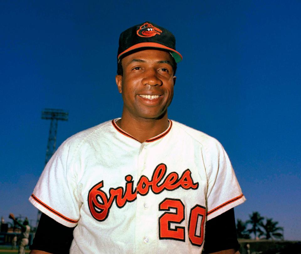 In this 1967 file photo, Baltimore Orioles outfielder Frank Robinson smiles. Hall of Famer Frank Robinson, the first black manager in Major League Baseball and the only player to win the MVP award in both leagues, has died. He was 83. Robinson had been in hospice care at his home in Bel Air. MLB confirmed his death Thursday, Feb. 7, 2019.